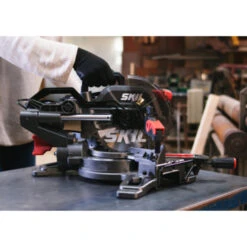 SKIL Afkortzaag / Verstekzaag 216mm Met Trekfunctie En Laser 1310AA 1600W + Snelklem 16 SKIL Afkortzaag / Verstekzaag 216mm Met Trekfunctie En Laser 1310AA 1600W + Snelklem -Gamma Winkel 123 145