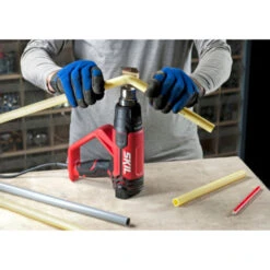 SKIL Heteluchtpistool 8040GA 2000W LCD Display + 4 Opzetstukken 10 SKIL Heteluchtpistool 8040GA 2000W LCD Display + 4 Opzetstukken -Gamma Winkel 123 3417